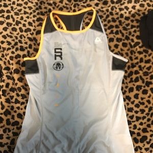 Reebok Spartan Shirt SZ. Sm Never worn Prefect Cd.